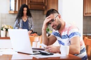 Man working at home, having problems