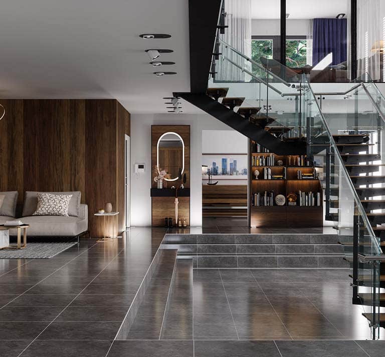 Luxury Modern House Interior With Corner Sofa, Bookshelf And Staircase