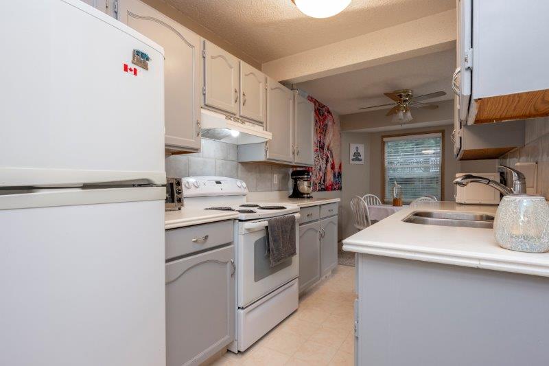 10 Shawinigan Lane Southwest, Calgary, 3 Bedrooms Bedrooms, 0 ,1.5 BathroomsBathrooms,Condos/Townhouses,For Rent,SHAWNESSY GREEN,10 Shawinigan Lane Southwest,0,2721