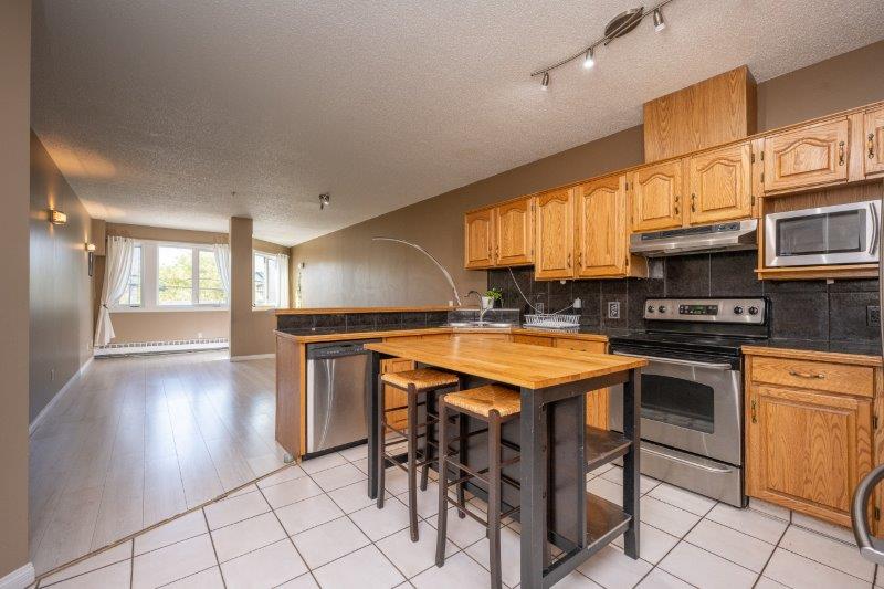 206, 103 10 Avenue NW, Calgary, 2 Bedrooms Bedrooms, 0 ,1.5 BathroomsBathrooms,Condos/Townhouses,For Rent,Rosemount Place,206, 103 10 Avenue NW,0,3292