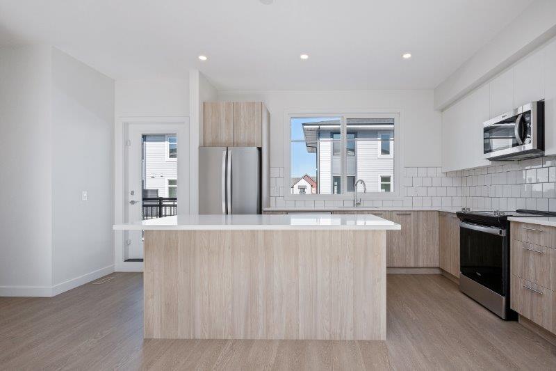 206, 857 Belmont Drive SW, Calgary, 2 Bedrooms Bedrooms, 0 ,2.5 BathroomsBathrooms,Condos/Townhouses,For Rent,206, 857 Belmont Drive SW,0,3308